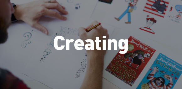 Caption: Creating

Image of person drawing on paper