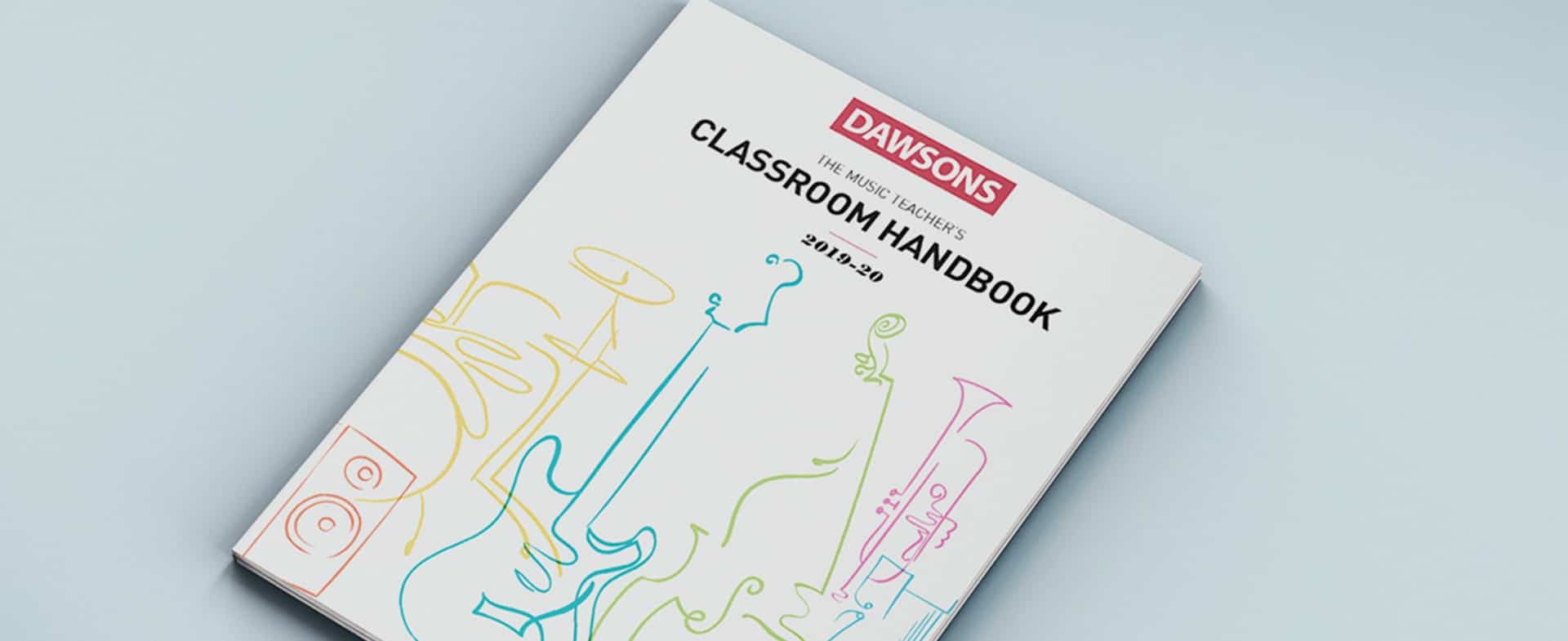 Dawsons Classroom Handbook on pale grey surface.