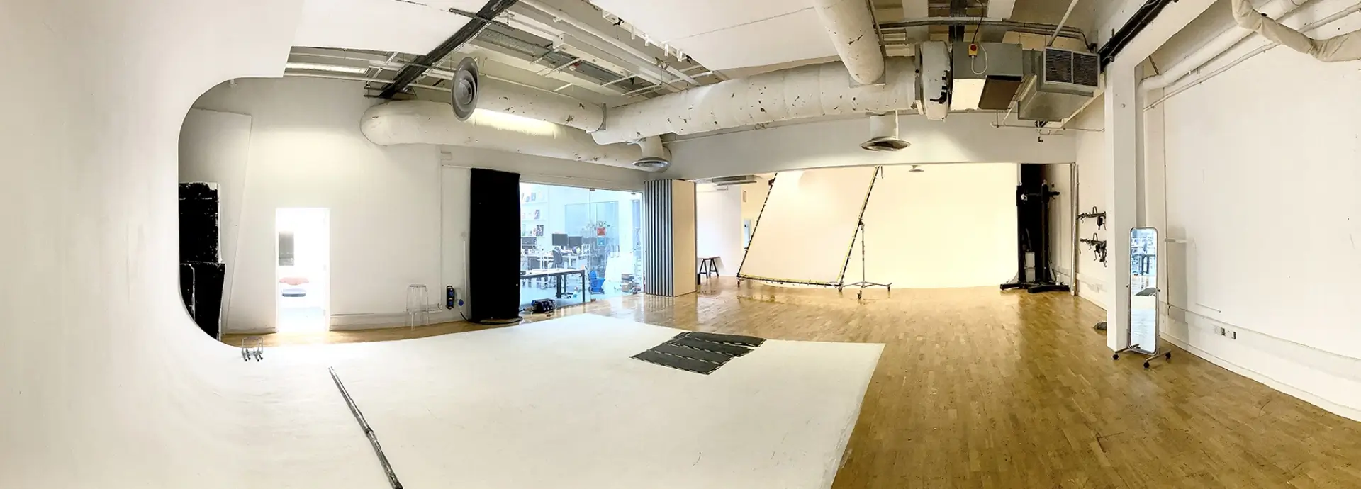 Wide shot of a Seventy7 photography studio.