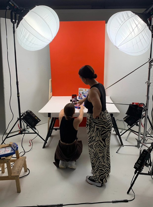 A behind the scenes shot of social media content being captured for Sambro's Disney toys.